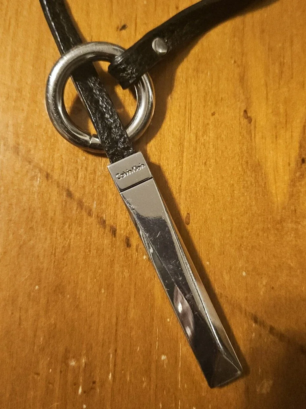 Calvin Klein Black Leather With Silver Bar Purse Charm Decor